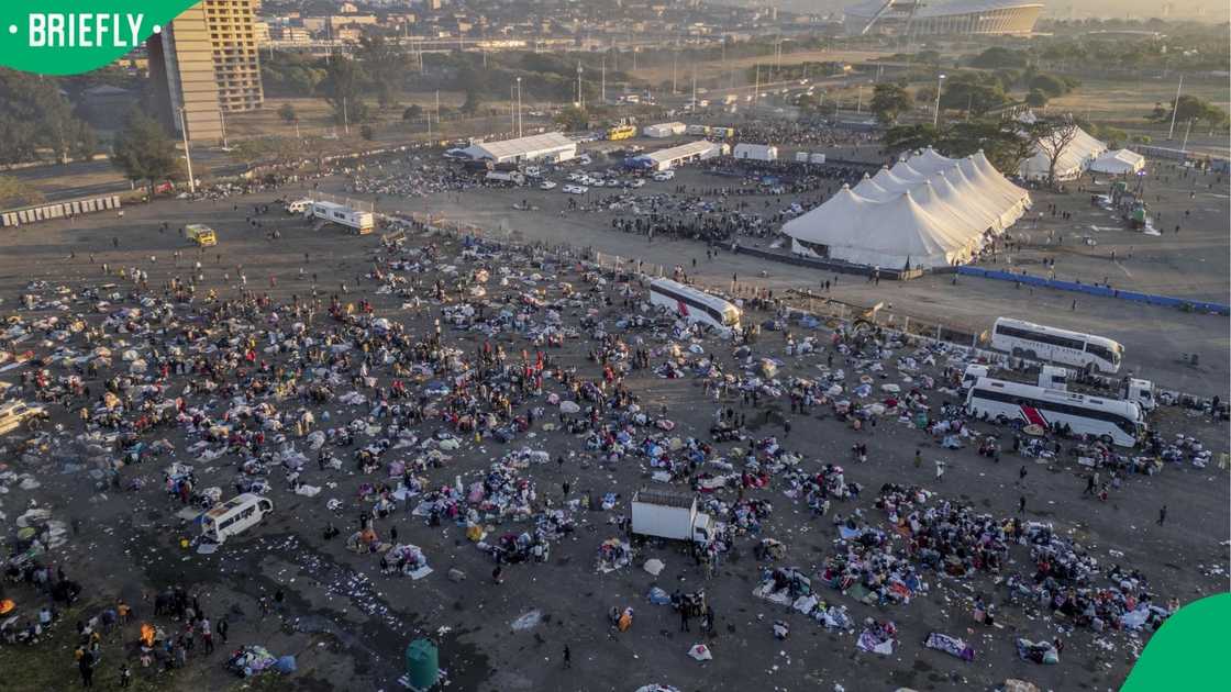 Thousands of Malawian migrants continue to gather at a temporary reception center in Durban
