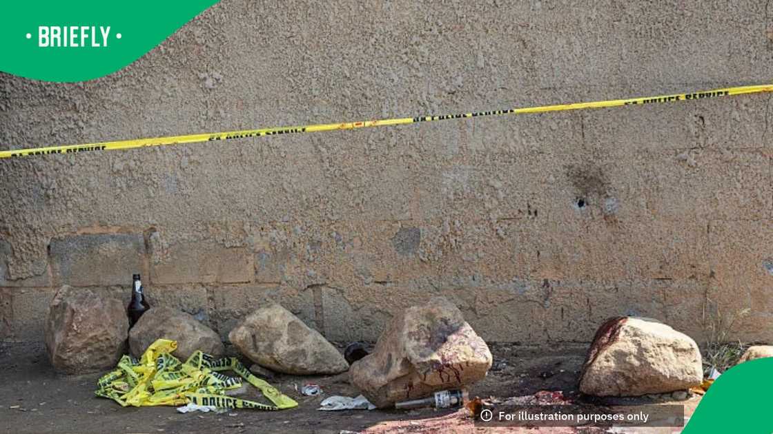 Residents gather near the scene where gunmen armed with assault rifles stormed a bar in Johannesburg on September 27, 2026 Residents gather near the scene where gunmen armed with assault rifles stormed a bar in Johannesburg on September 27, 2026