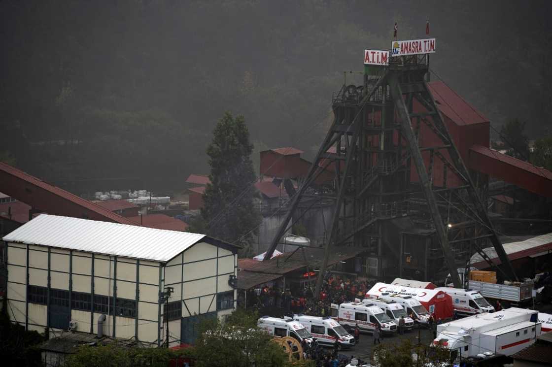 A photograph shows an outside view of the coal mine after an explosion in Amasra, in Bartin Province, Turkey, on October 15, 2022. Rescuers desperately searched for signs of life on October 15, 2022 after a methane blast at a coal mine in northern Turkey killed at least 28 people and trapped dozens of others hundreds of metres underground. A photograph shows an outside view of the coal mine after an explosion in Amasra, in Bartin Province, Turkey, on October 15, 2022. Rescuers desperately searched for signs of life on October 15, 2022 after a methane blast at a coal mine in northern Turkey killed at least 28 people and trapped dozens of others hundreds of metres underground.