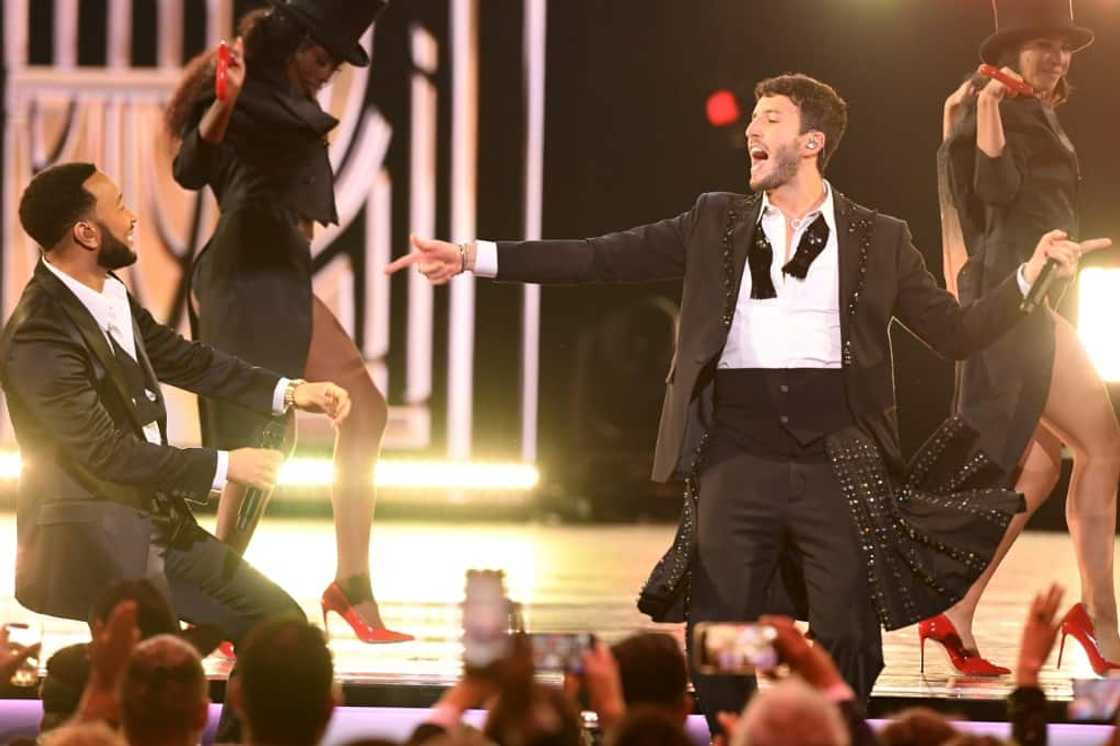 Colombian singer Sebastian Yatra (R) and US singer-songwriter John Legend perform on stage during the 23rd Annual Latin Grammy awards at the Mandalay Bay's Michelob Ultra Arena in Las Vegas, Nevada, on November 17, 2022 Colombian singer Sebastian Yatra (R) and US singer-songwriter John Legend perform on stage during the 23rd Annual Latin Grammy awards at the Mandalay Bay's Michelob Ultra Arena in Las Vegas, Nevada, on November 17, 2022