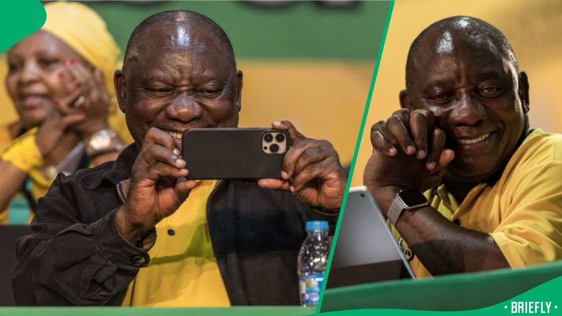 President Cyril Ramaphosa smiling and holding his iPhone. President Cyril Ramaphosa smiling and holding his iPhone.