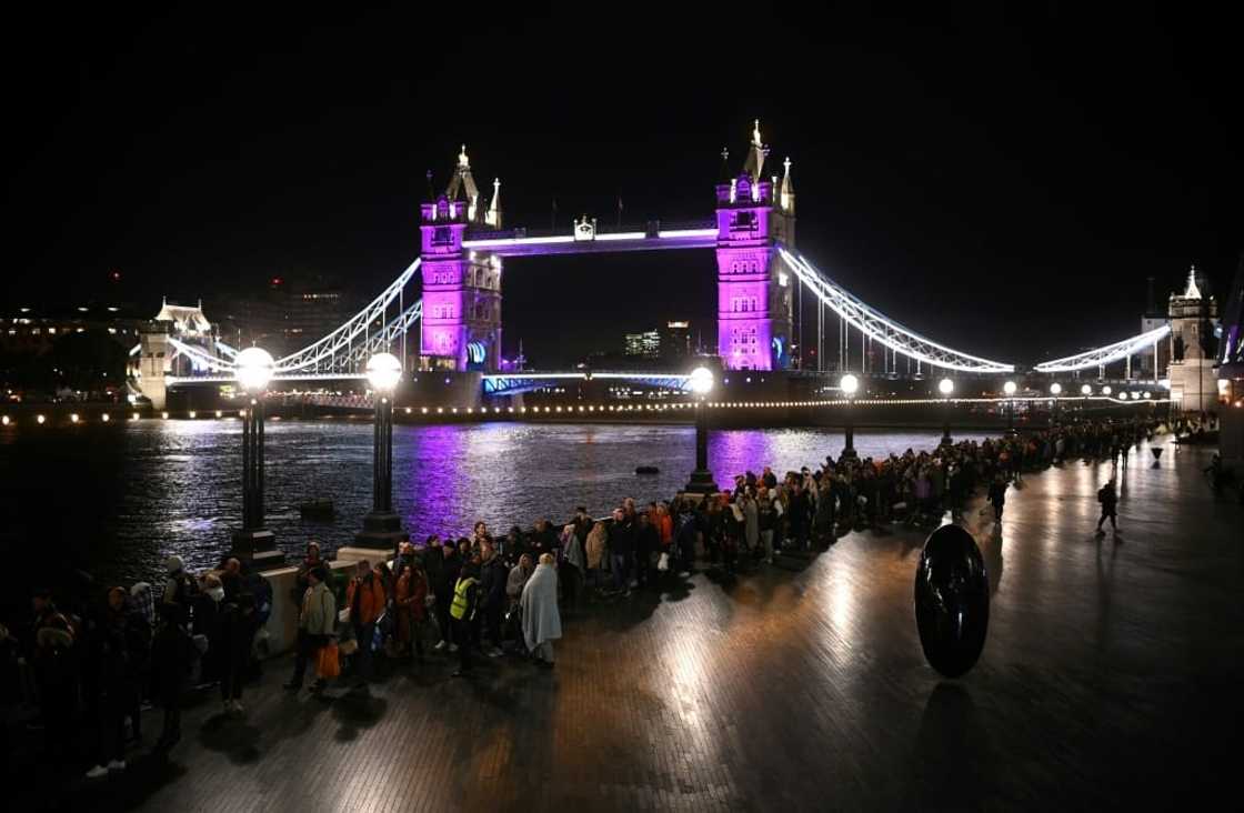 Hundreds of thousands of people queued round the clock to pay their respects as the queen's coffin lay in state Hundreds of thousands of people queued round the clock to pay their respects as the queen's coffin lay in state