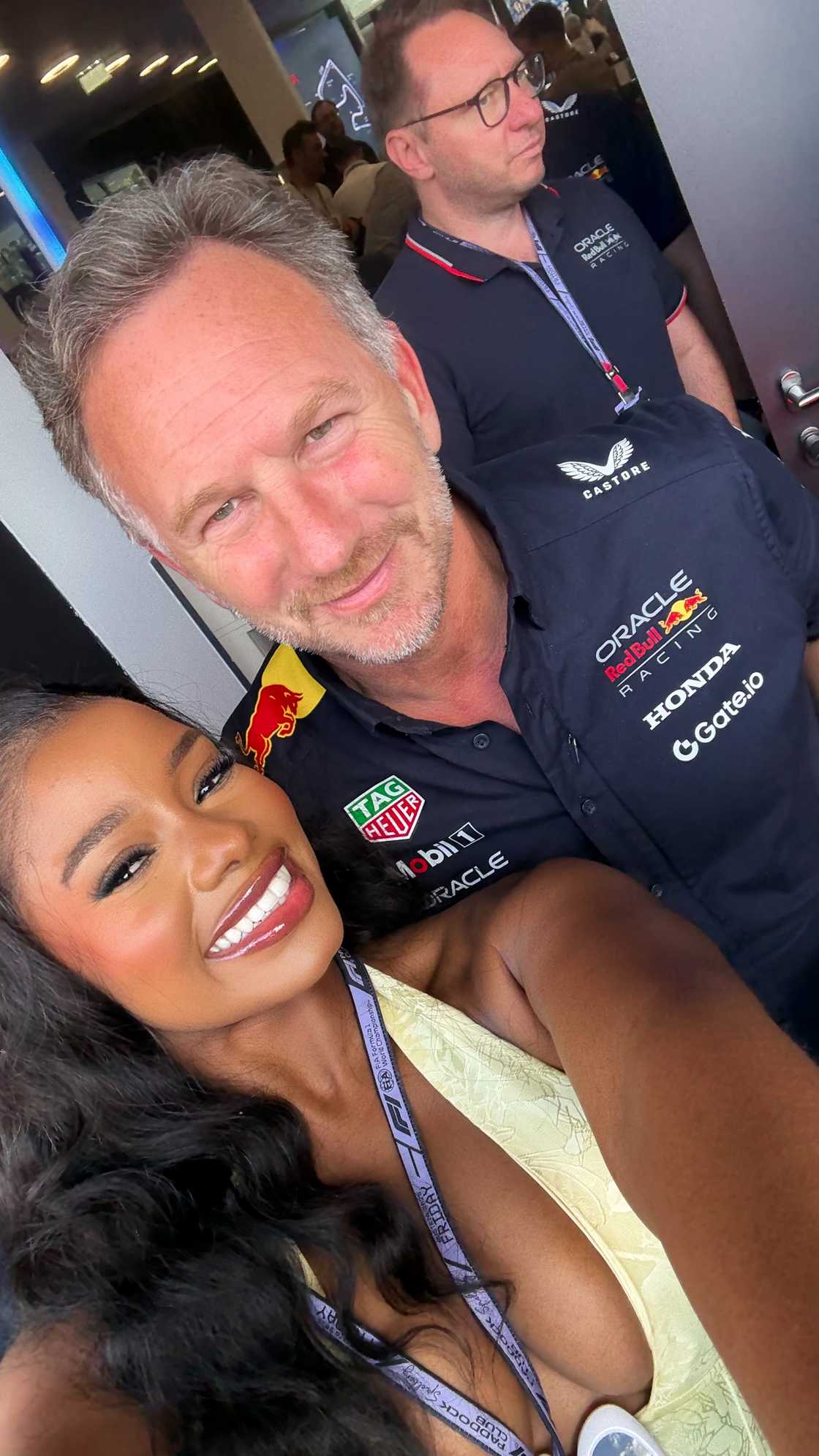 Selfie of Pamela Mtanga smiling with then Red Bull team principal Christian Horner in the paddock at the Austrian Grand Prix.