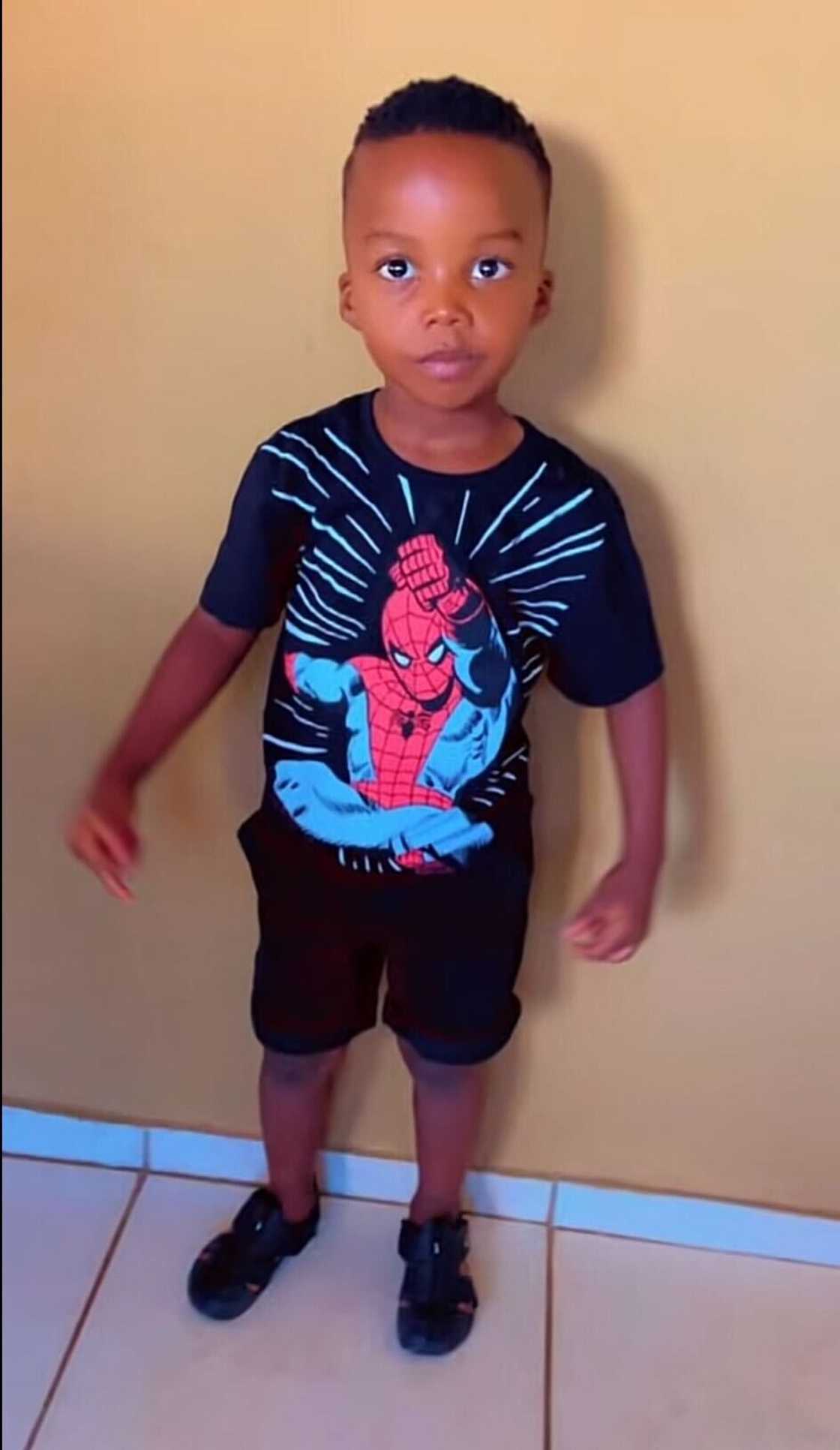 A little boy appeared in a TikTok photo.