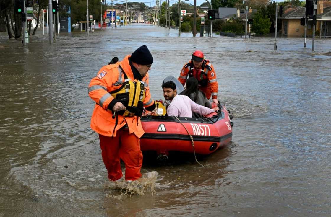 Emergency workers evacuate residents from flooded properties in the Maribyrnong suburb of Melbourne Emergency workers evacuate residents from flooded properties in the Maribyrnong suburb of Melbourne