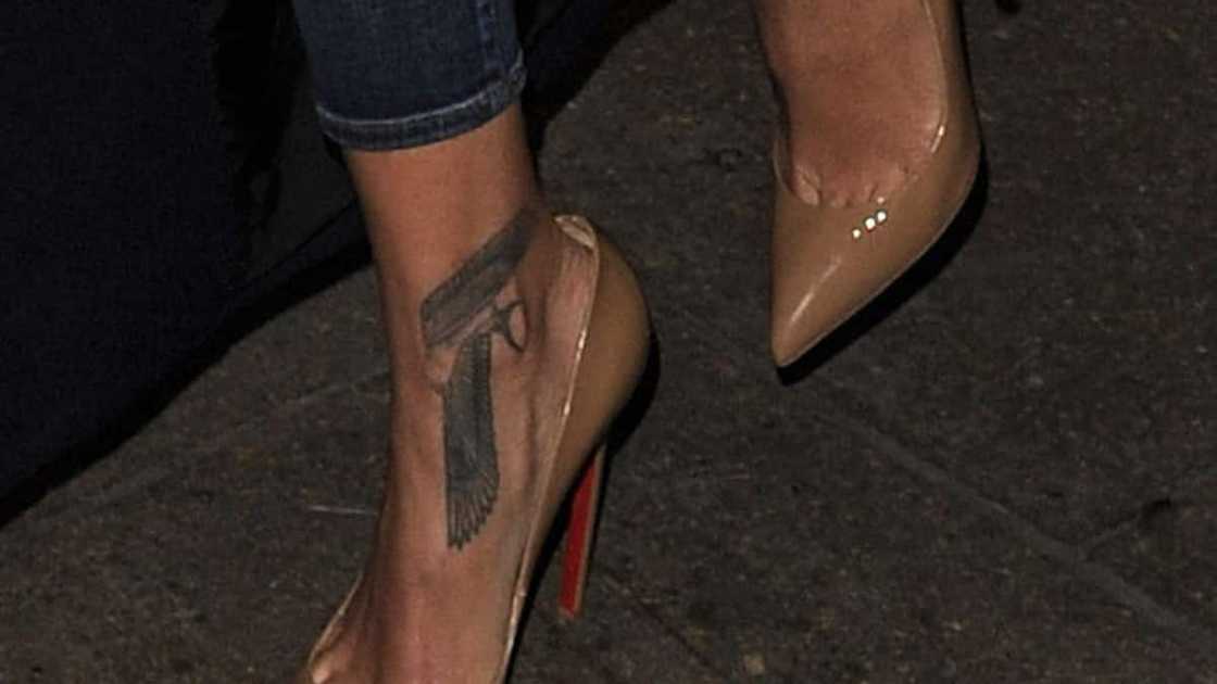 Rihanna's falcon body art Rihanna's falcon body art