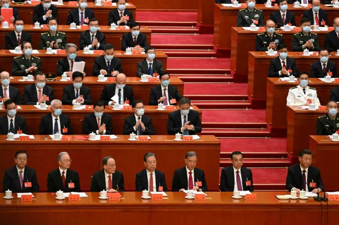 China's President Xi Jinping (bottom R) was given an unprecedented third term as Communist leader by a party congress last month China's President Xi Jinping (bottom R) was given an unprecedented third term as Communist leader by a party congress last month