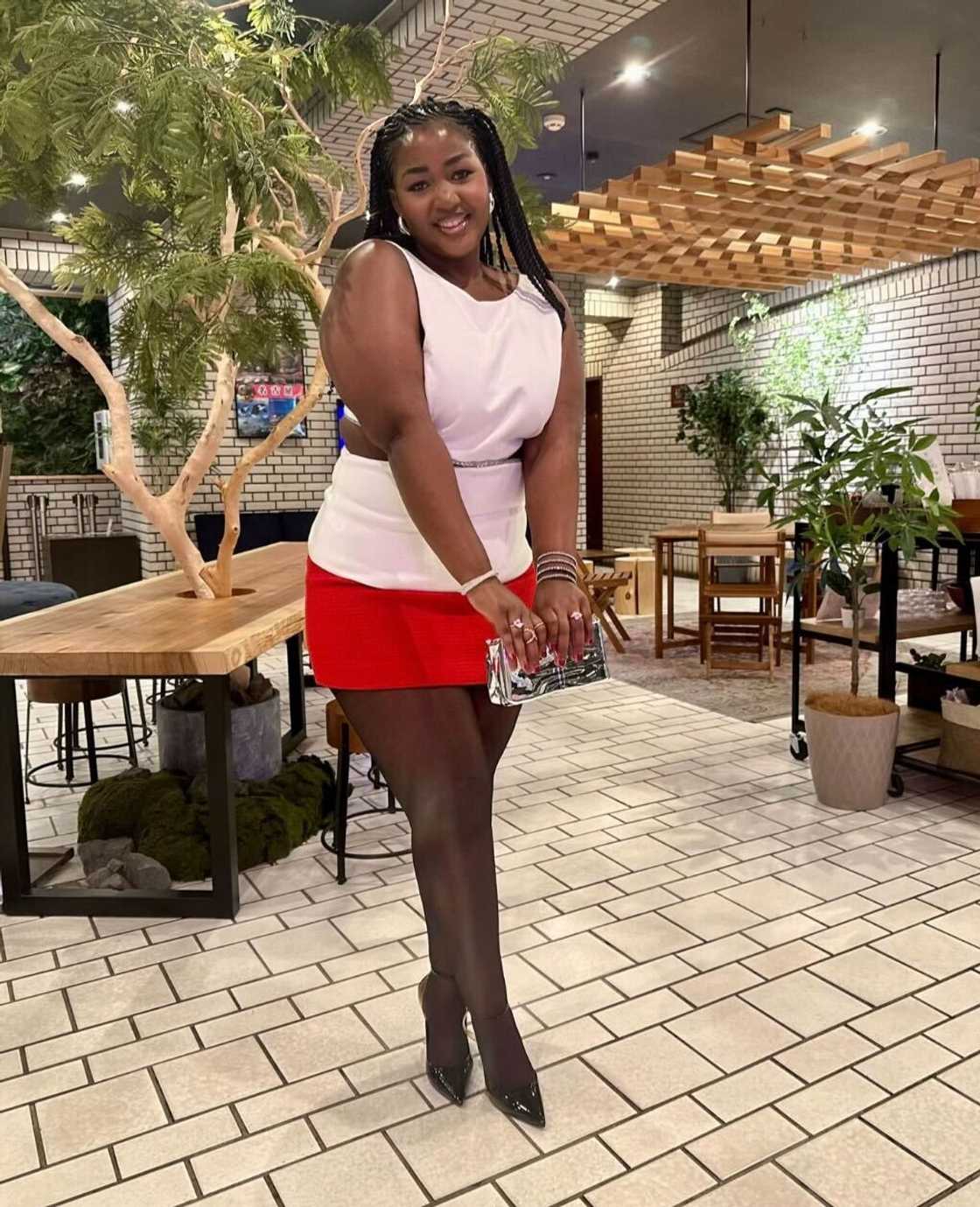 A young African lady showcased how her hair was braided by an Asian stylist in a TikTok video A young African lady showcased how her hair was braided by an Asian stylist in a TikTok video