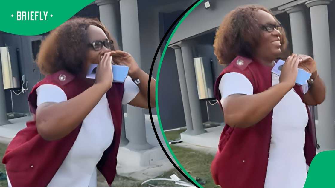 Woman cant help shouting in joy at the house her daughter built for her. Woman cant help shouting in joy at the house her daughter built for her.
