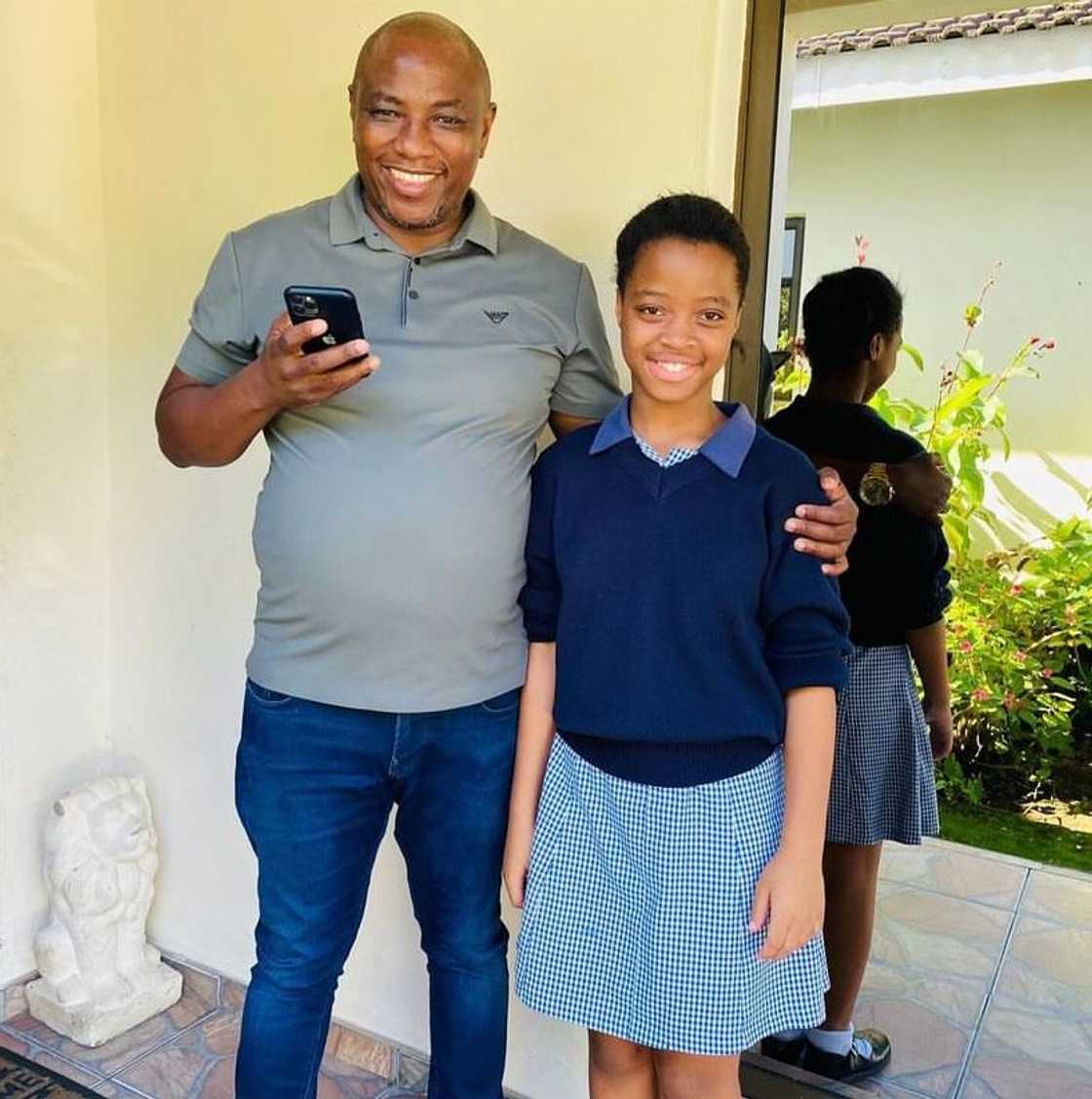 Musa Mseleku with his grandchild from Sne Mseleku Musa Mseleku with his grandchild from Sne Mseleku