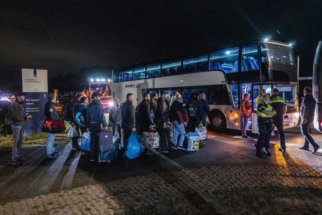 The Dutch government says hundreds of asylum-seekers have been were bussed from the overcrowded and crisis-hit Ter Apel migrant centre The Dutch government says hundreds of asylum-seekers have been were bussed from the overcrowded and crisis-hit Ter Apel migrant centre