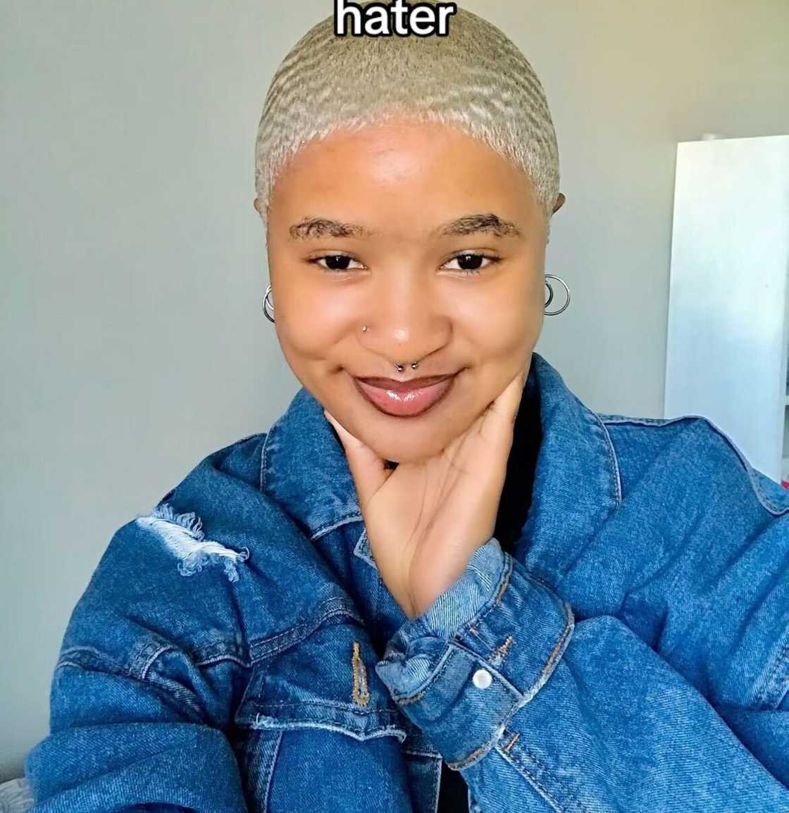 A South African woman was in awe as she flaunted her stunning new wig. A South African woman was in awe as she flaunted her stunning new wig.