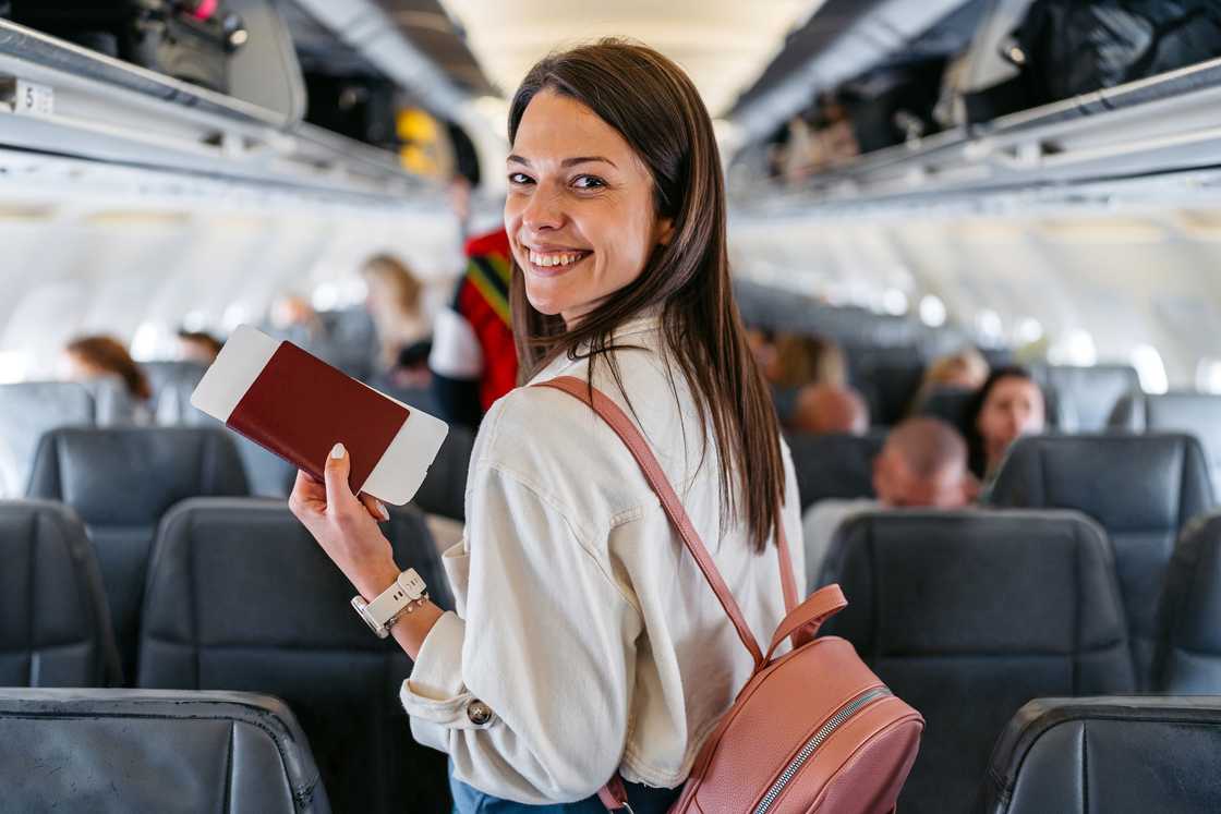 A lady boarding a plane