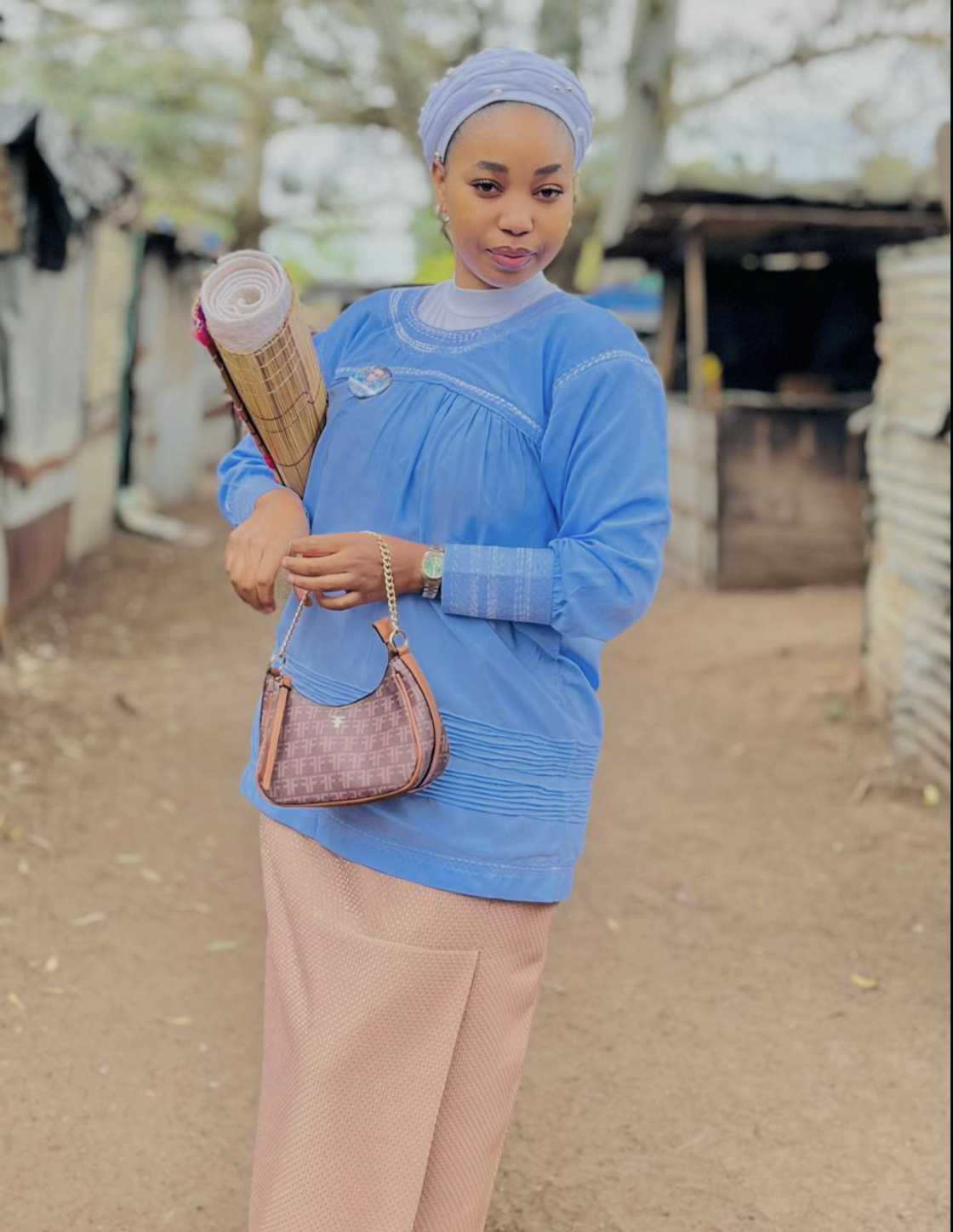 A woman was photographed going to the Shembe church A woman was photographed going to the Shembe church