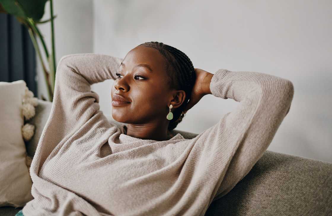 A lady in beige sweater A lady in beige sweater