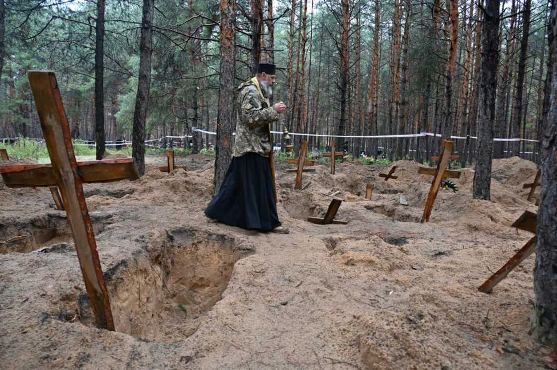 More than 440 graves were discovered near Izyum after it was recaptured from Russian forces More than 440 graves were discovered near Izyum after it was recaptured from Russian forces