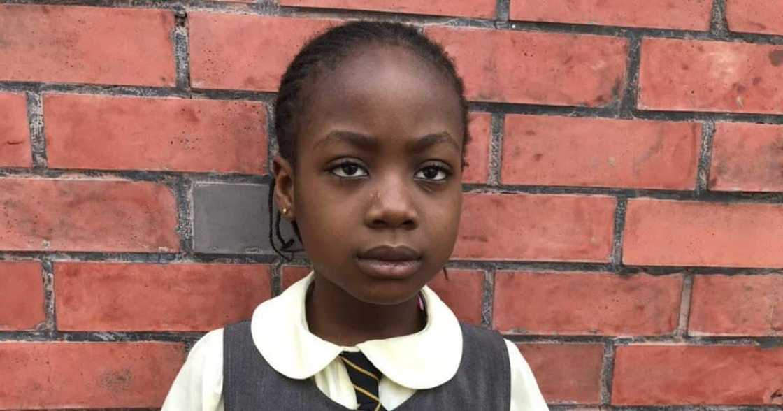 Little girl scores 100% in Mathematics test.