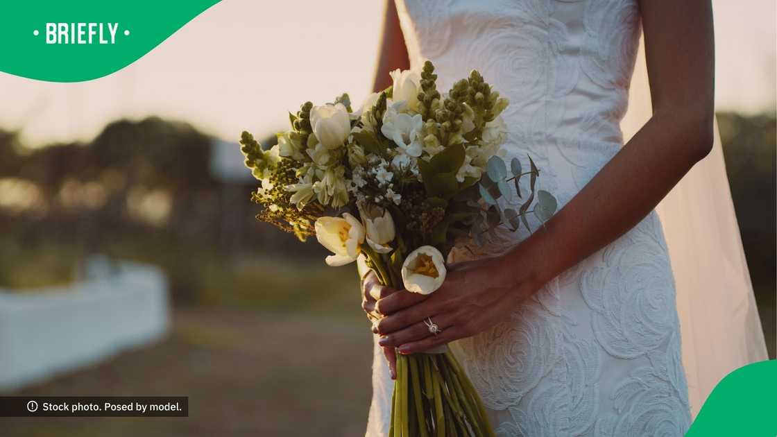 Traditional bride shows off upgraded flower bouquet
