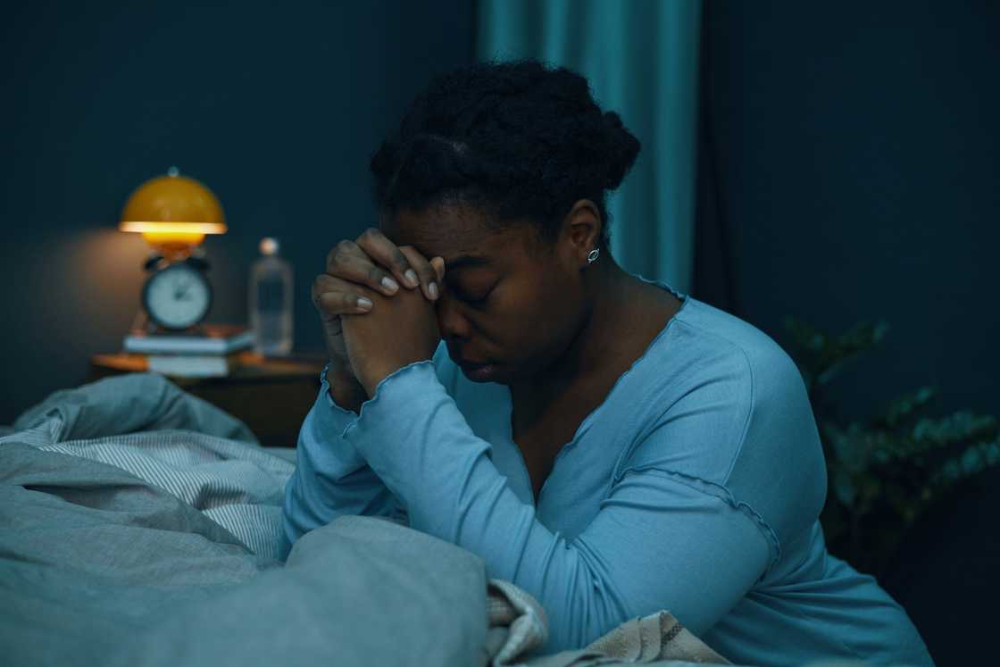 A woman prays A woman prays