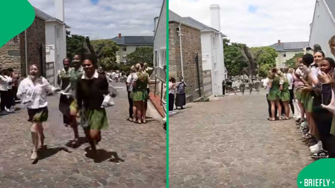 A screenshot from the video of girls running