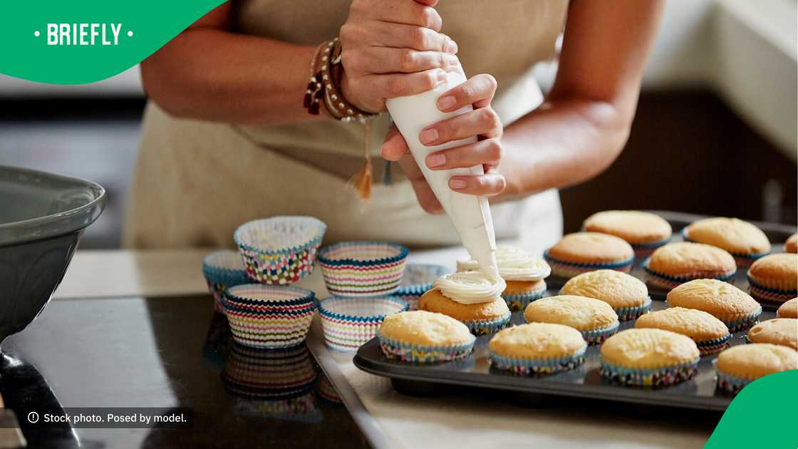 The purple pap making lady has a knack for baking. The purple pap making lady has a knack for baking.