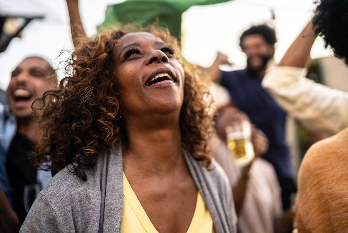 Fans watching a football match Fans watching a football match