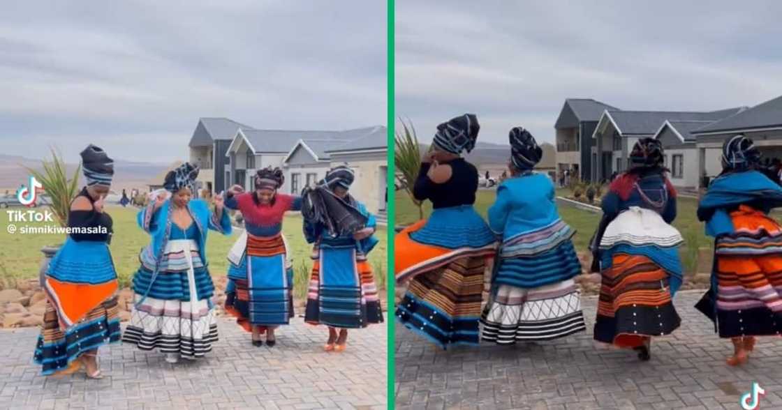 Four women wearing beautiful Xhosa traditional clothes Four women wearing beautiful Xhosa traditional clothes