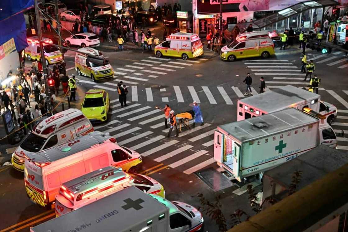 Authorities cordoned off a street where some 120 people were killed in a stampede in South Korea's capital Seoul Authorities cordoned off a street where some 120 people were killed in a stampede in South Korea's capital Seoul