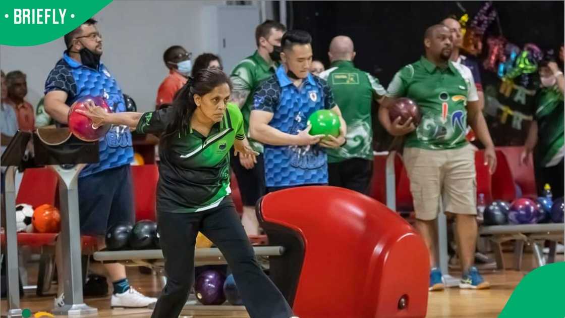 Gita Soorajlal bowling at a tournament.