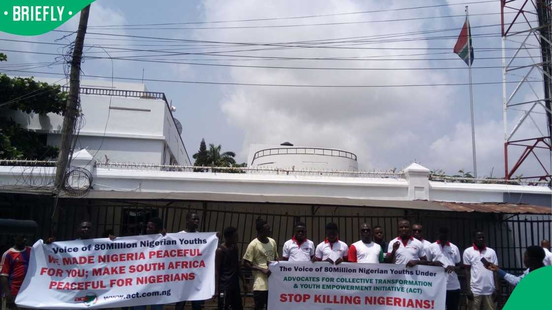 A group of young Nigerians carrying a banner to protest the killing of Nigerians in South Africa in 2017 A group of young Nigerians carrying a banner to protest the killing of Nigerians in South Africa in 2017