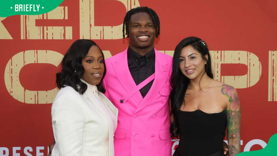 Travis Hunter with Ferrante Harris and Leanna Lenee
