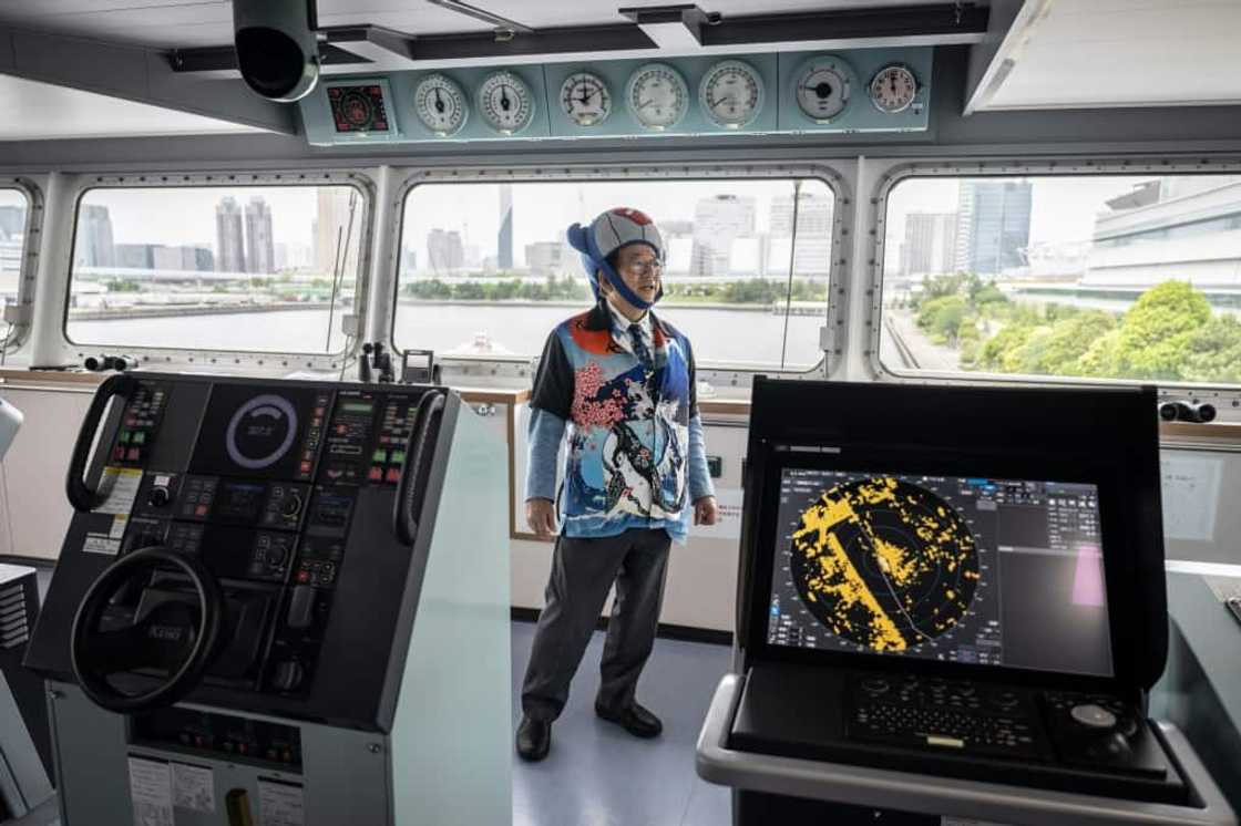 In whale-motif jacket, shirt and tie plus a whale-shaped hat, Hideki Tokoro shows off Japan's new whaling 'mothership' In whale-motif jacket, shirt and tie plus a whale-shaped hat, Hideki Tokoro shows off Japan's new whaling 'mothership'