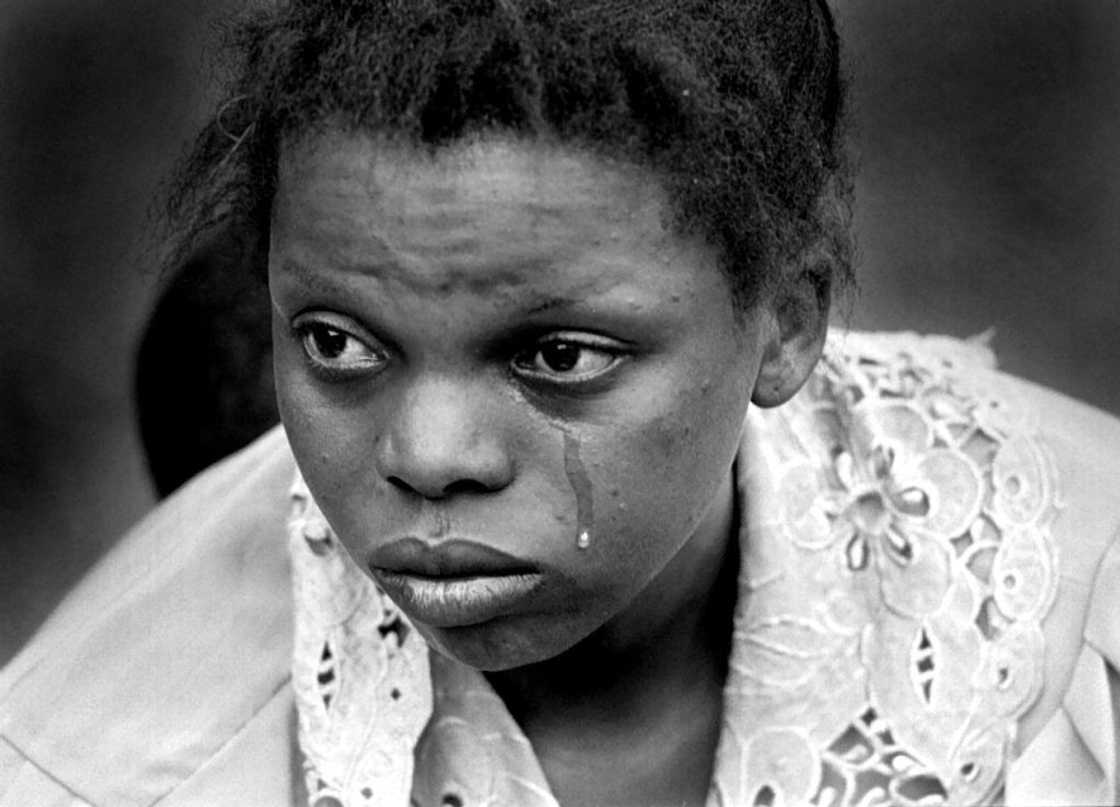 African woman in tears