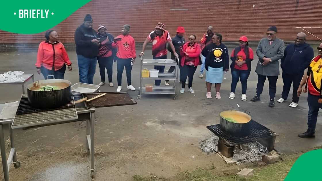 Staff members at the Northdale Hospital cooked outside of the facility after a power cut Staff members at the Northdale Hospital cooked outside of the facility after a power cut