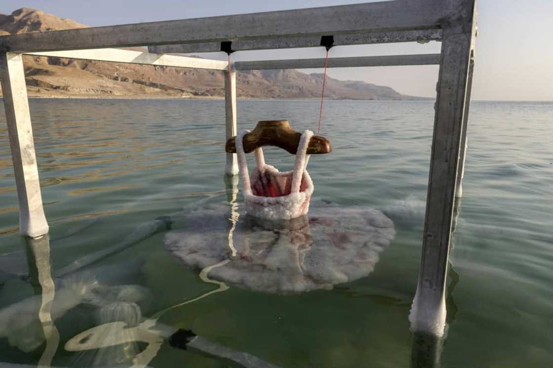 A ballerina dress is submerged in the Dead Sea and encrusted with salt, a project by Israeli artist Sigalit Landau A ballerina dress is submerged in the Dead Sea and encrusted with salt, a project by Israeli artist Sigalit Landau