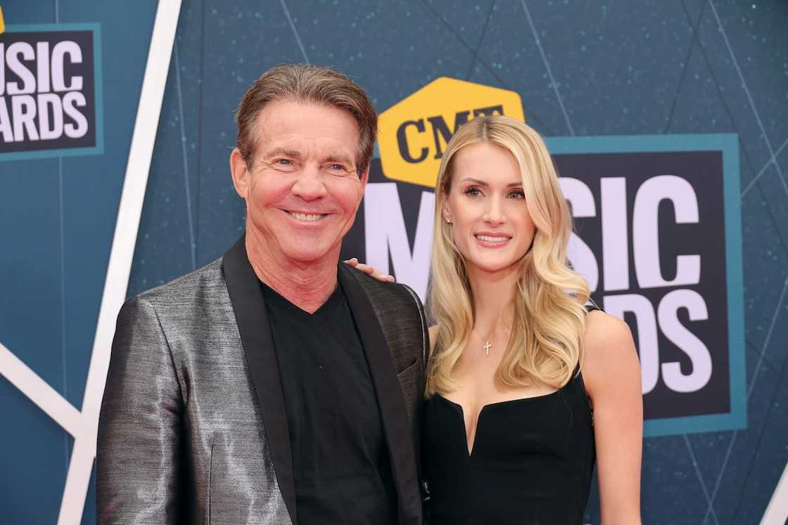 Dennis Quaid and Laura Savoie during the 2022 CMT Music Awards at Nashville Municipal Auditorium on 11 April 2022 in Nashville, Tennessee. Dennis Quaid and Laura Savoie during the 2022 CMT Music Awards at Nashville Municipal Auditorium on 11 April 2022 in Nashville, Tennessee.