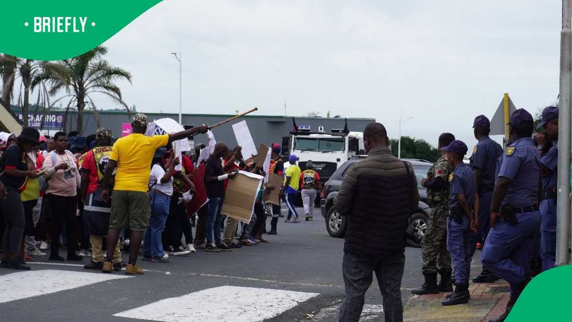 Workers protesting outside the council chambers in Port Shepstone.