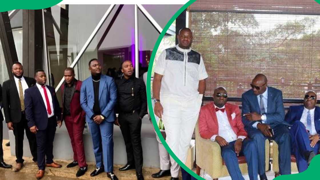 The Gcaba brothers posing for pictures in suits