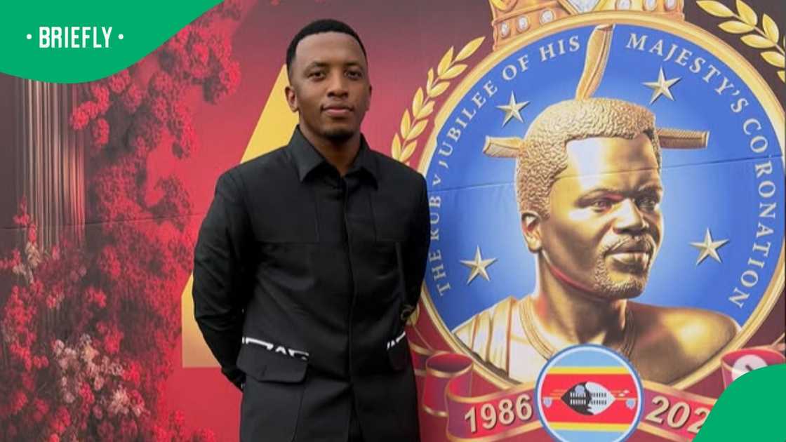 Dumi Mkokstad flaunts his gun. Dumi Mkokstad flaunts his gun.