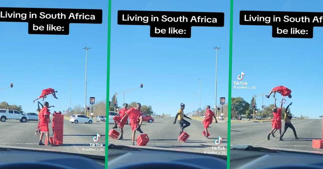 Talented boys performed acrobatics at street intersection