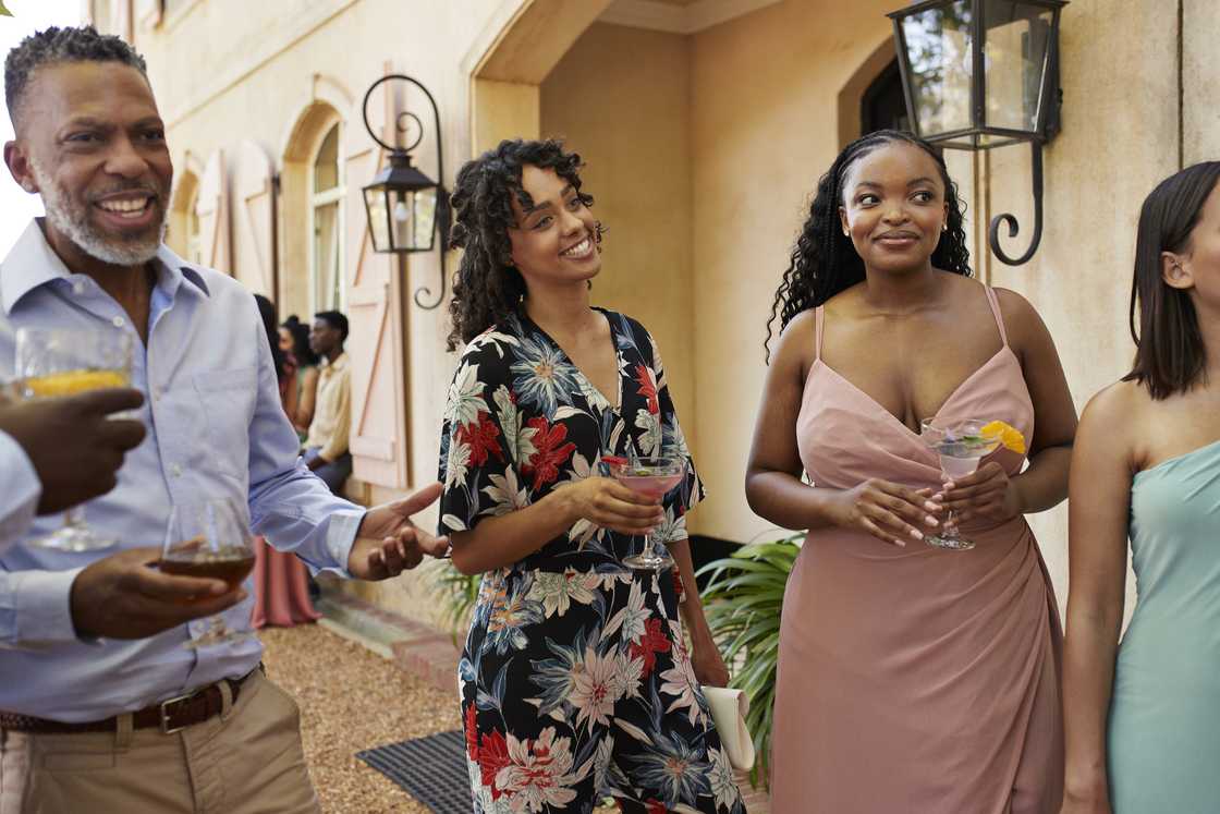 Guests arrive for a charity event at the Wellington mansion. Guests arrive for a charity event at the Wellington mansion.
