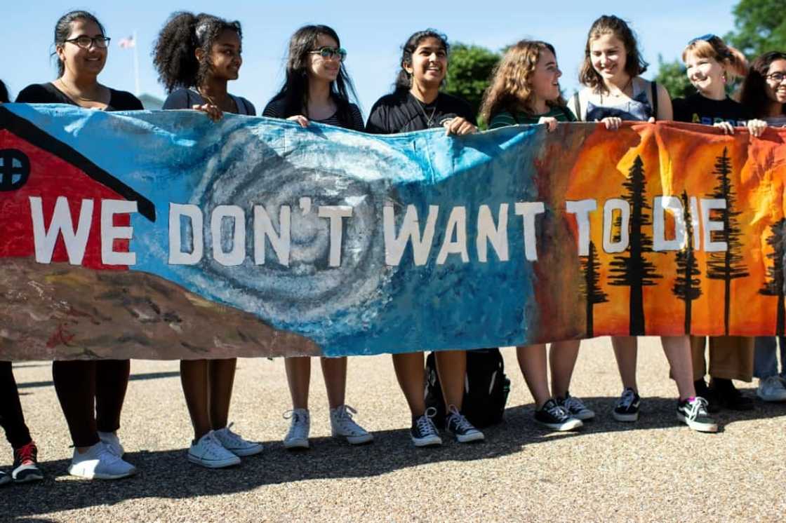 Young Americans protest outside the White House in Washington, DC during a "Fridays for Future" march in 2019