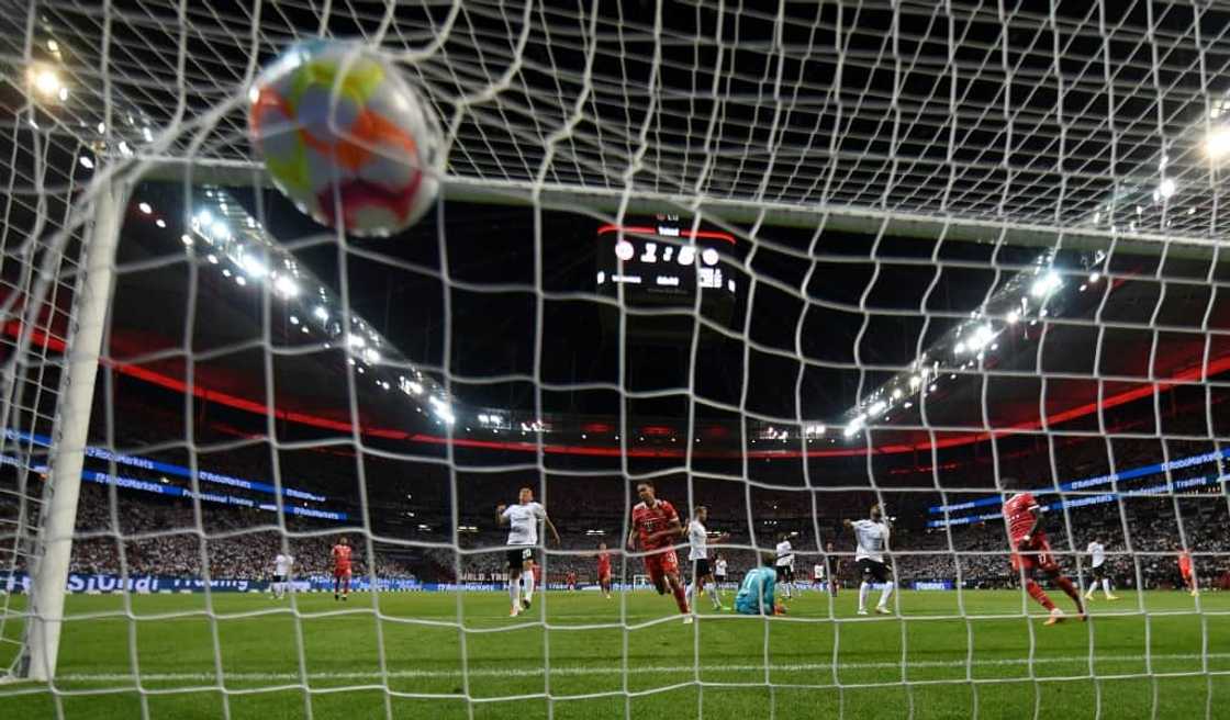 Net gain: Bayern Munich's German midfielder Jamal Musiala scores one of his two goals Net gain: Bayern Munich's German midfielder Jamal Musiala scores one of his two goals