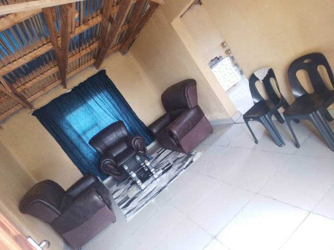 Woman shows off her lounge area. Woman shows off her lounge area.