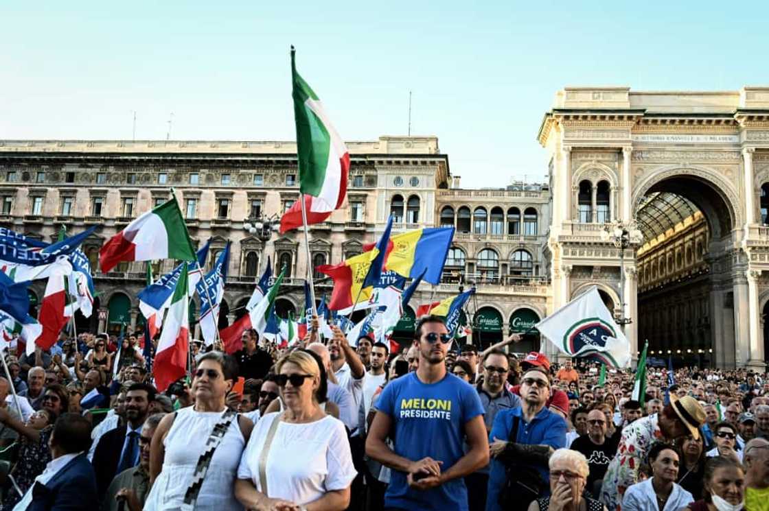 Supporters of Giorgia Meloni, leader of Italy's far-right Brothers of Italy party, attend a campaign rally in Milan Supporters of Giorgia Meloni, leader of Italy's far-right Brothers of Italy party, attend a campaign rally in Milan