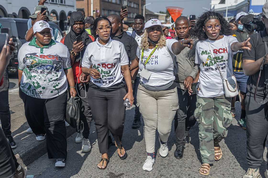 March and March Movement leader Jacinta Ngobese-Zuma (2nd L) arrives following clashes between foreign nationals and March and March Movement during a demonstration against undocumented migrants in Durban, on September 3, 2026