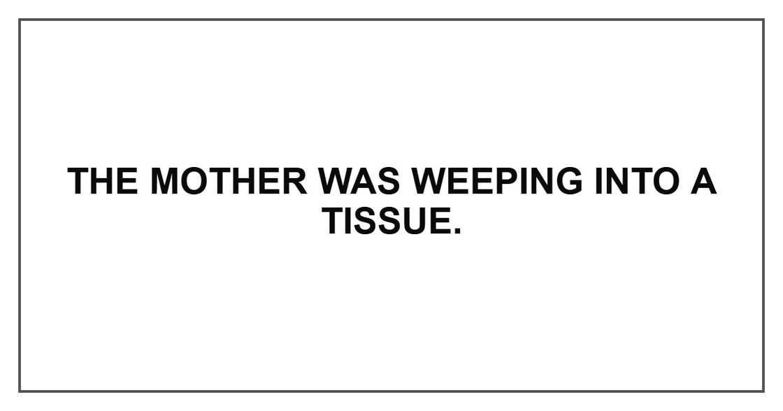 The mother was weeping into a tissue. The mother was weeping into a tissue.