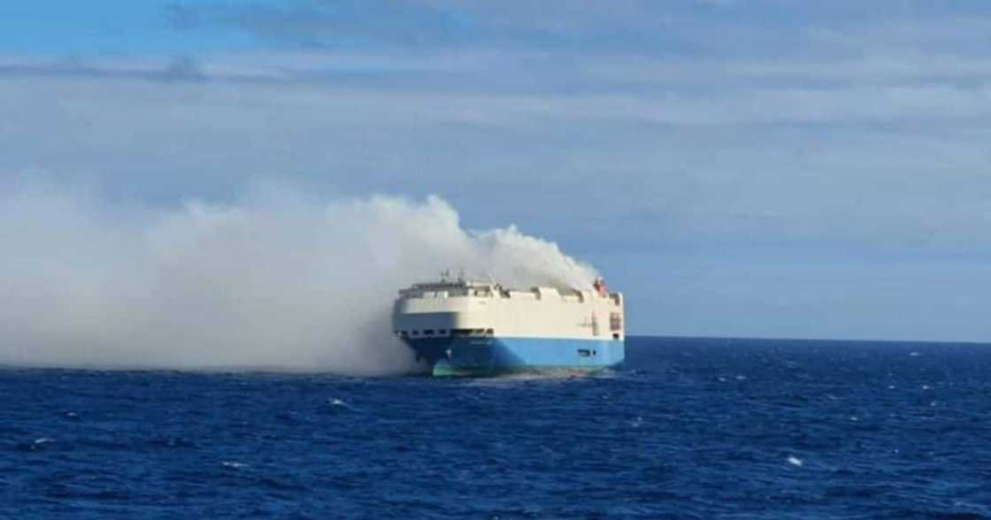Burning Car Cargo Ship With Bentleys, Porsches and Volkswagens Stranded in the Atlantic Ocean Burning Car Cargo Ship With Bentleys, Porsches and Volkswagens Stranded in the Atlantic Ocean