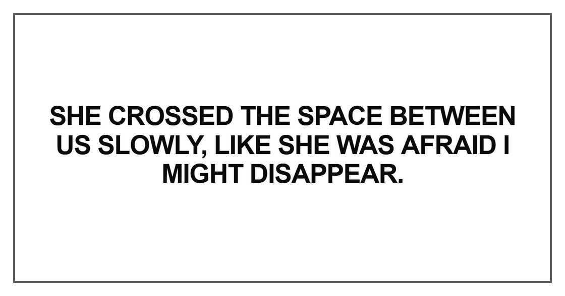 She crossed the space between us slowlyq