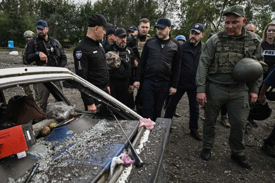 AFP saw more than a dozen damaged cars and vans on Friday afternoon, all with their windows blown out AFP saw more than a dozen damaged cars and vans on Friday afternoon, all with their windows blown out